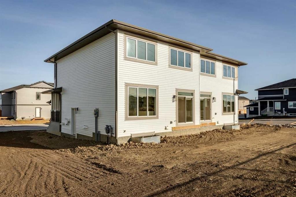 307 Dawson Dock Way, Chestermere, AB - Outdoor With Deck Patio Veranda