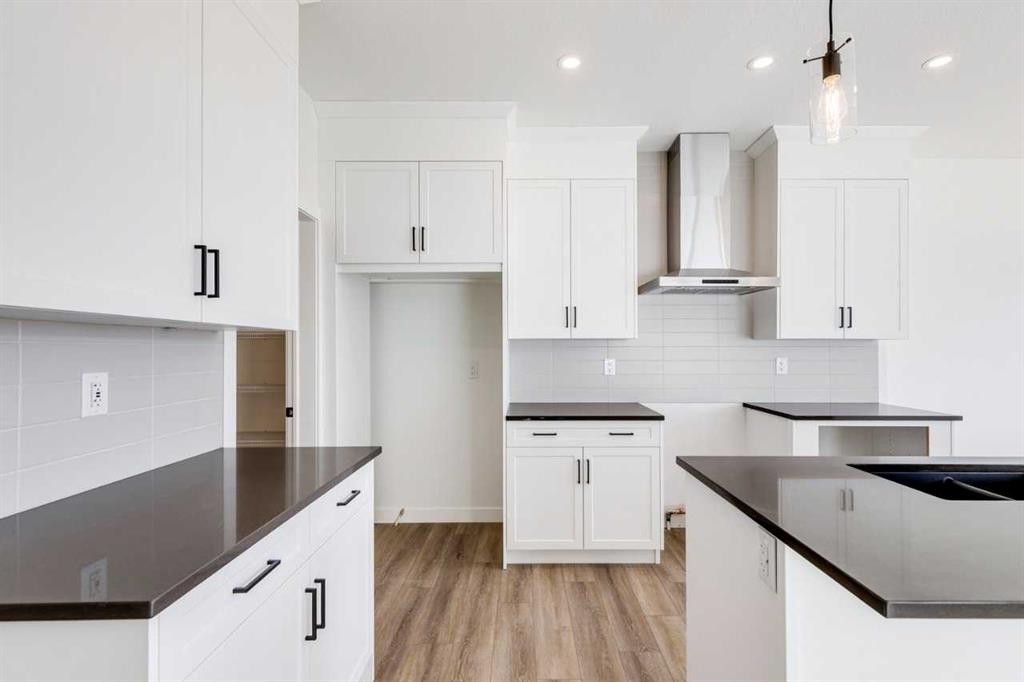 307 Dawson Dock Way, Chestermere, AB - Indoor Photo Showing Kitchen With Double Sink