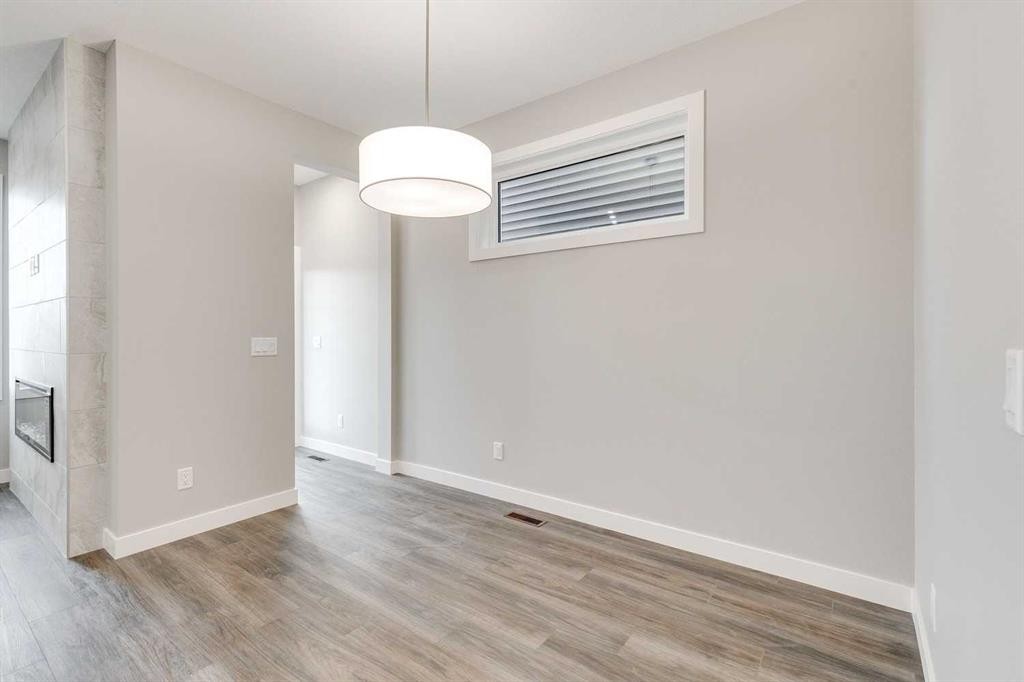 483 Hotchkiss Manor Se, Calgary, AB - Indoor Photo Showing Other Room