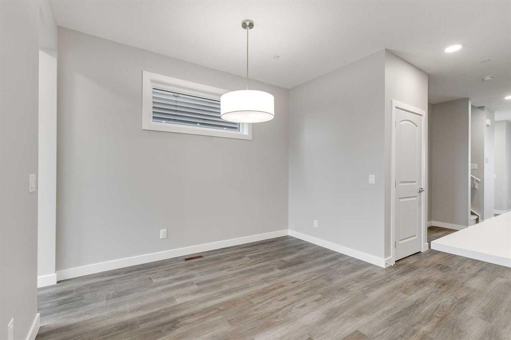 483 Hotchkiss Manor Se, Calgary, AB - Indoor Photo Showing Other Room