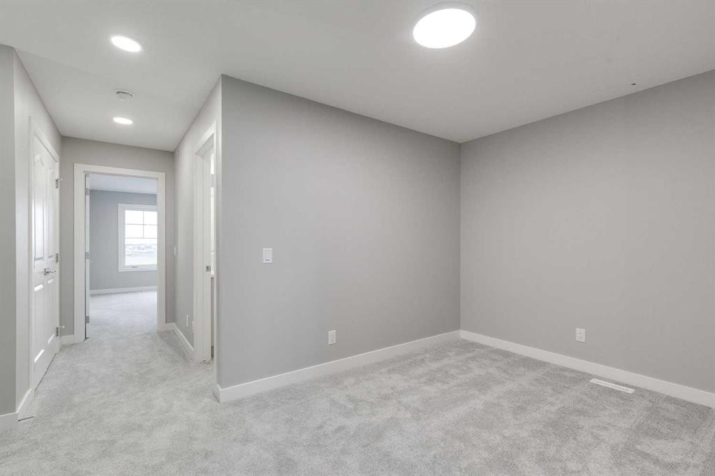 483 Hotchkiss Manor Se, Calgary, AB - Indoor Photo Showing Other Room