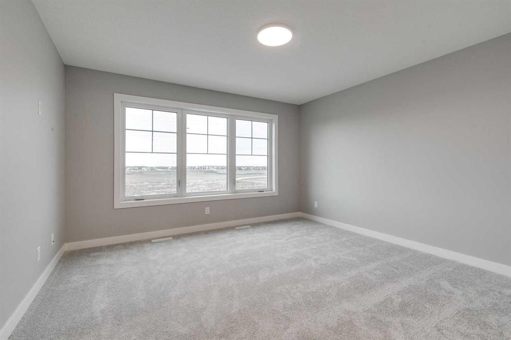 483 Hotchkiss Manor Se, Calgary, AB - Indoor Photo Showing Other Room