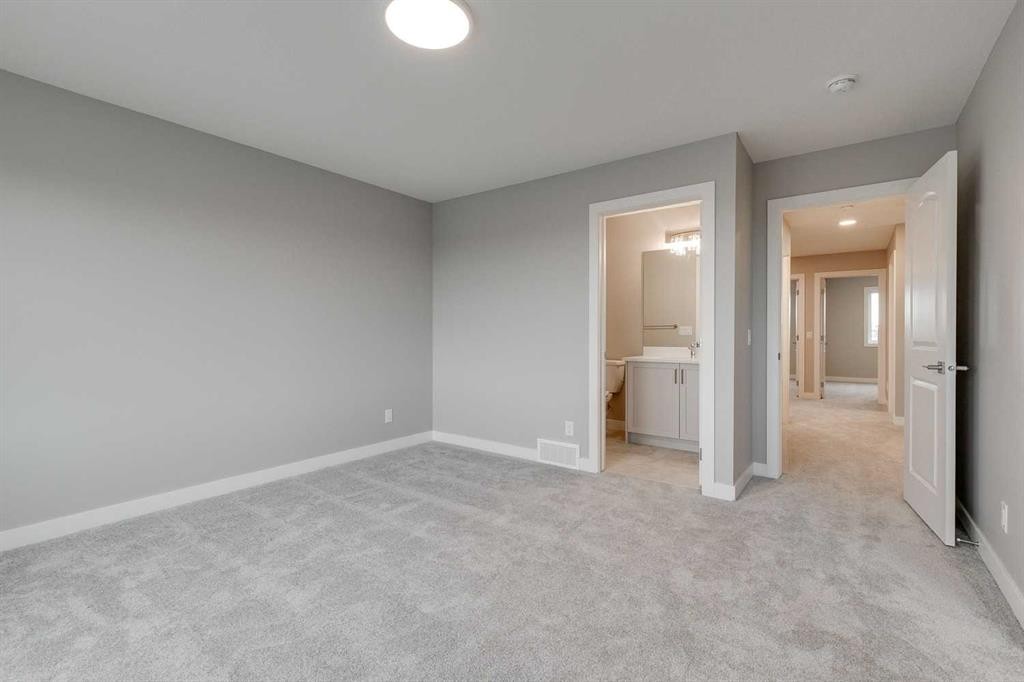 483 Hotchkiss Manor Se, Calgary, AB - Indoor Photo Showing Other Room