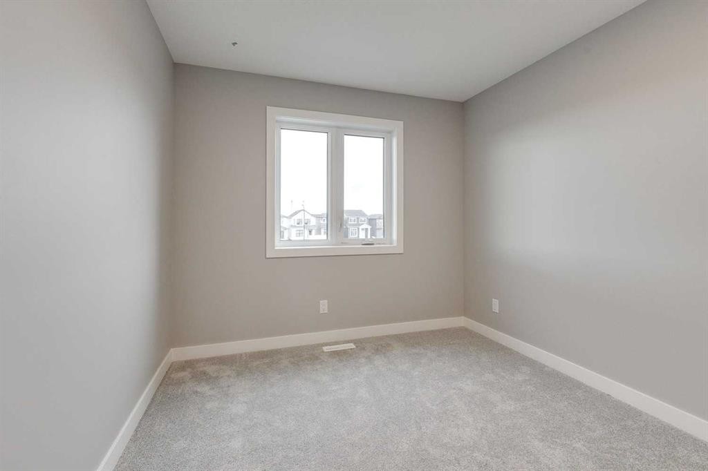 483 Hotchkiss Manor Se, Calgary, AB - Indoor Photo Showing Other Room