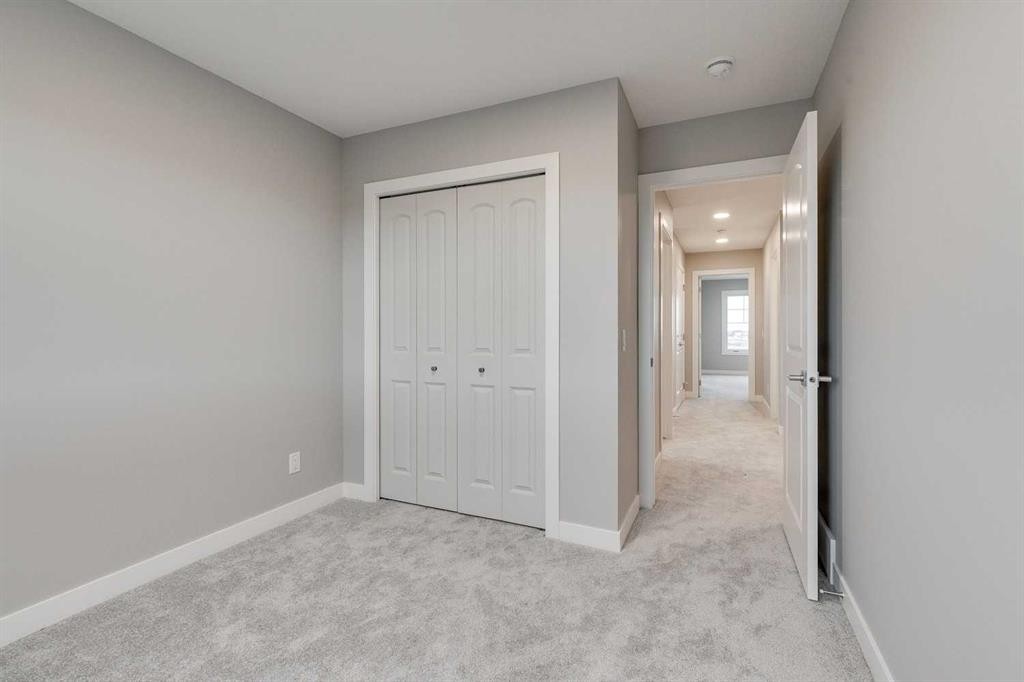 483 Hotchkiss Manor Se, Calgary, AB - Indoor Photo Showing Other Room