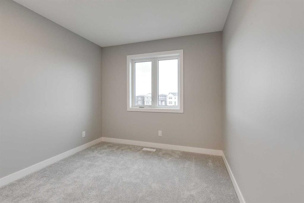 483 Hotchkiss Manor Se, Calgary, AB - Indoor Photo Showing Other Room