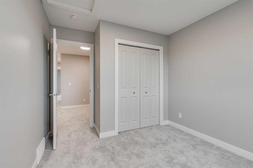 483 Hotchkiss Manor Se, Calgary, AB - Indoor Photo Showing Other Room
