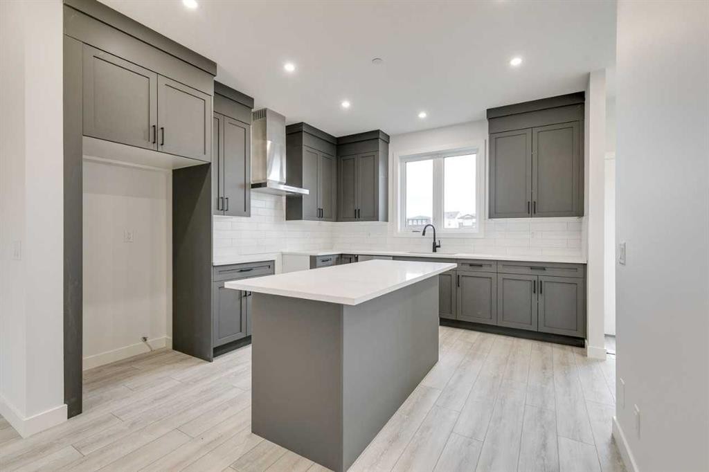 479 Hotchkiss Manor Se, Calgary, AB - Indoor Photo Showing Kitchen With Upgraded Kitchen
