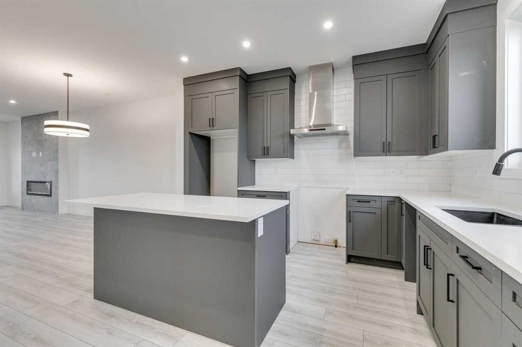 479 Hotchkiss Manor Se, Calgary, AB - Indoor Photo Showing Kitchen With Upgraded Kitchen