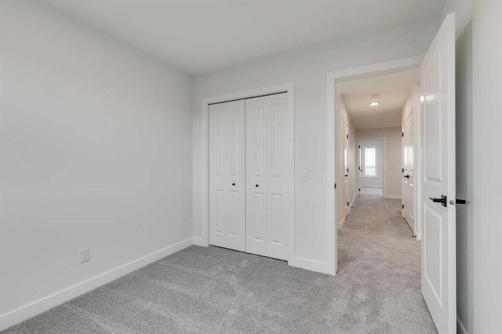 479 Hotchkiss Manor Se, Calgary, AB - Indoor Photo Showing Other Room