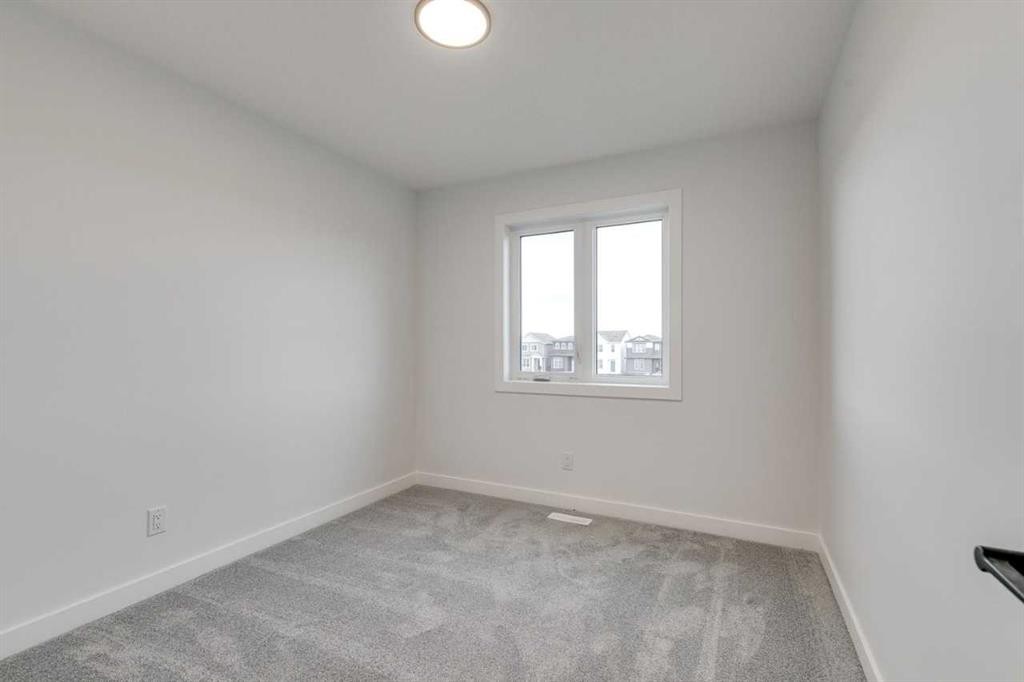 479 Hotchkiss Manor Se, Calgary, AB - Indoor Photo Showing Other Room