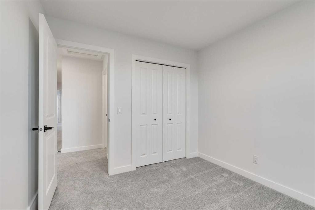 479 Hotchkiss Manor Se, Calgary, AB - Indoor Photo Showing Other Room