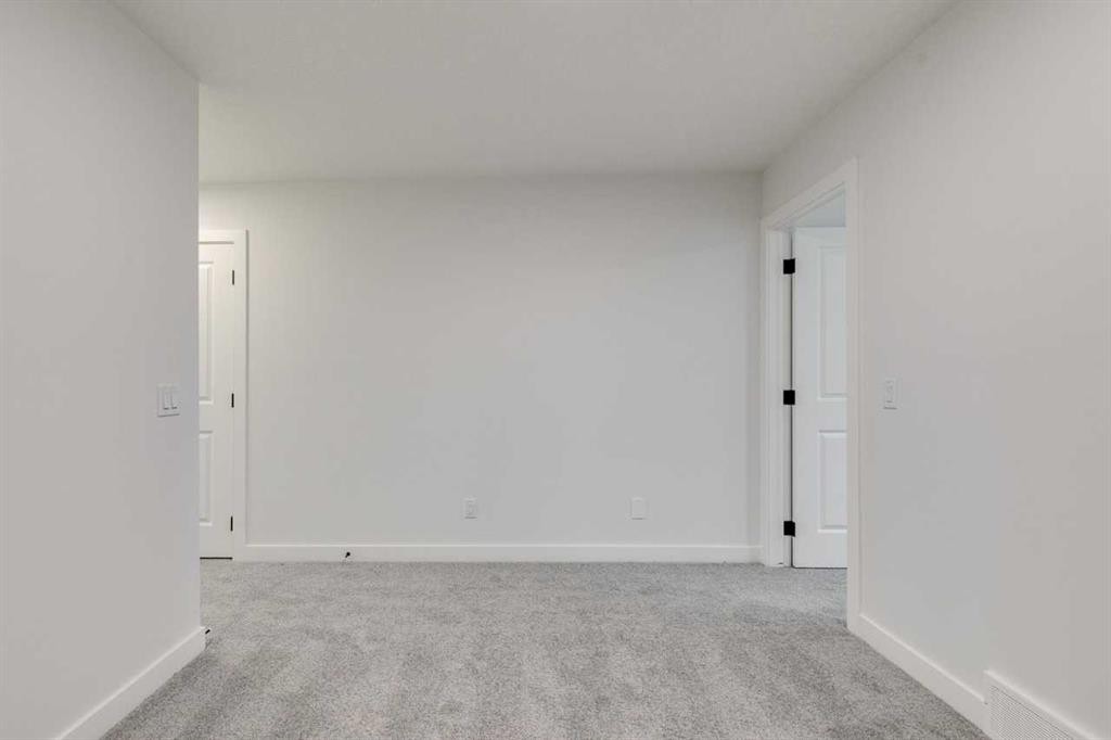 479 Hotchkiss Manor Se, Calgary, AB - Indoor Photo Showing Other Room