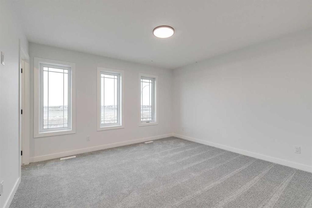 479 Hotchkiss Manor Se, Calgary, AB - Indoor Photo Showing Other Room