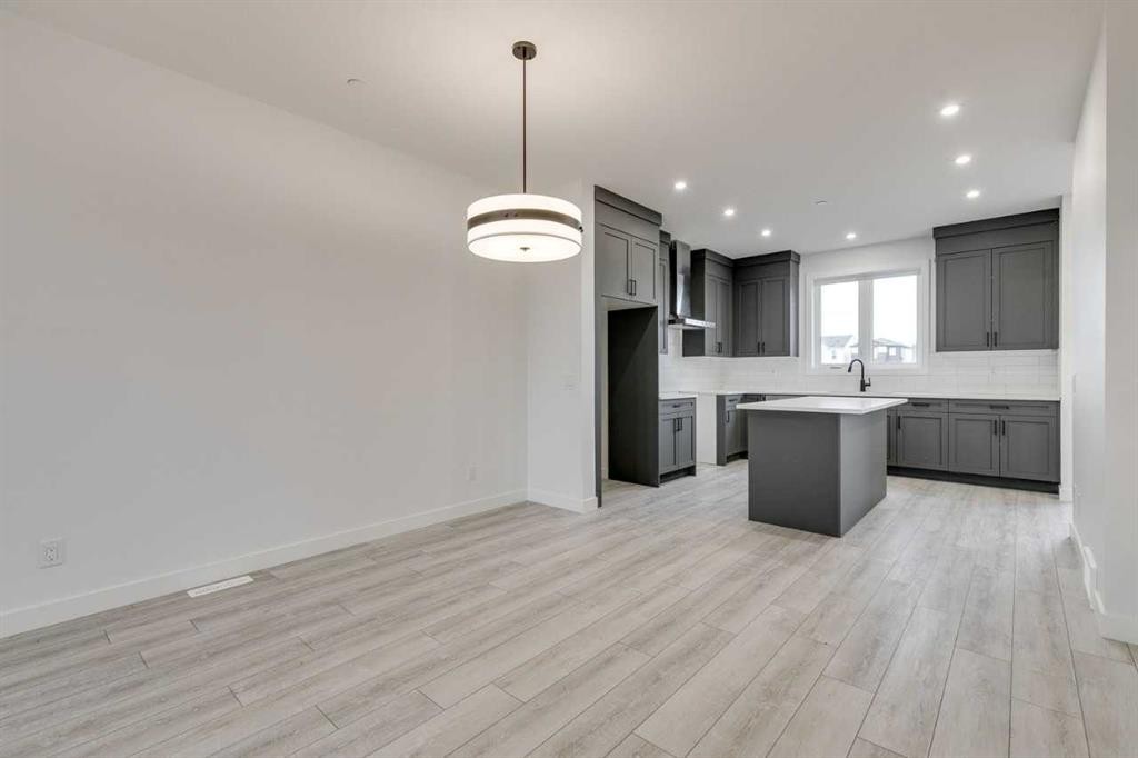 479 Hotchkiss Manor Se, Calgary, AB - Indoor Photo Showing Kitchen With Upgraded Kitchen