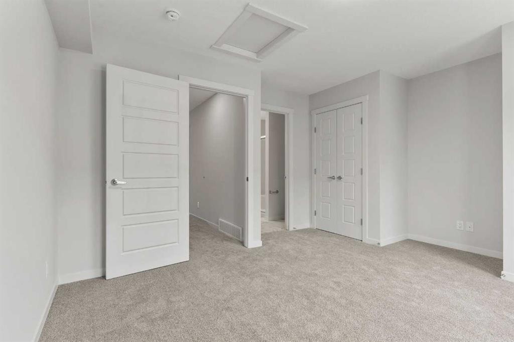 106-40 Livingston Parade Ne, Calgary, AB - Indoor Photo Showing Other Room