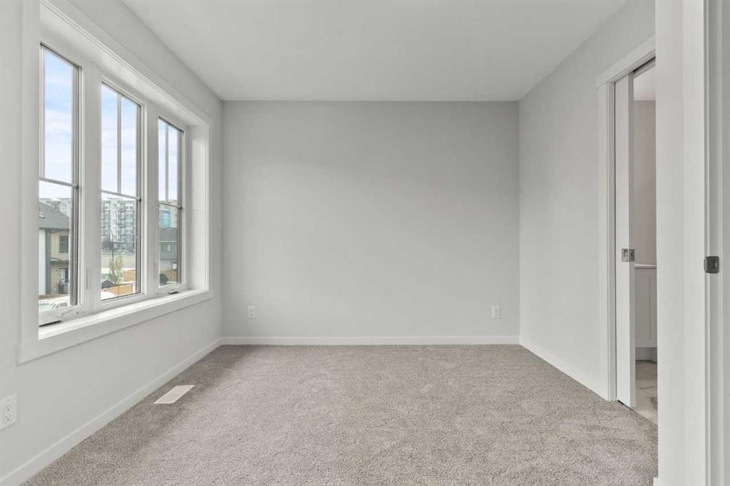 106-40 Livingston Parade Ne, Calgary, AB - Indoor Photo Showing Other Room
