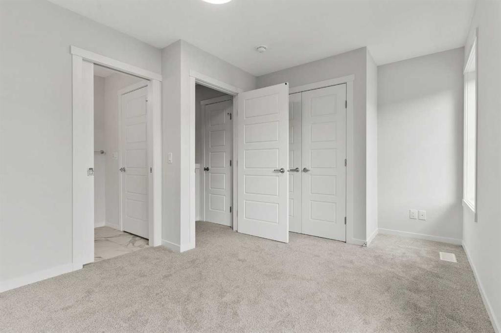 106-40 Livingston Parade Ne, Calgary, AB - Indoor Photo Showing Other Room