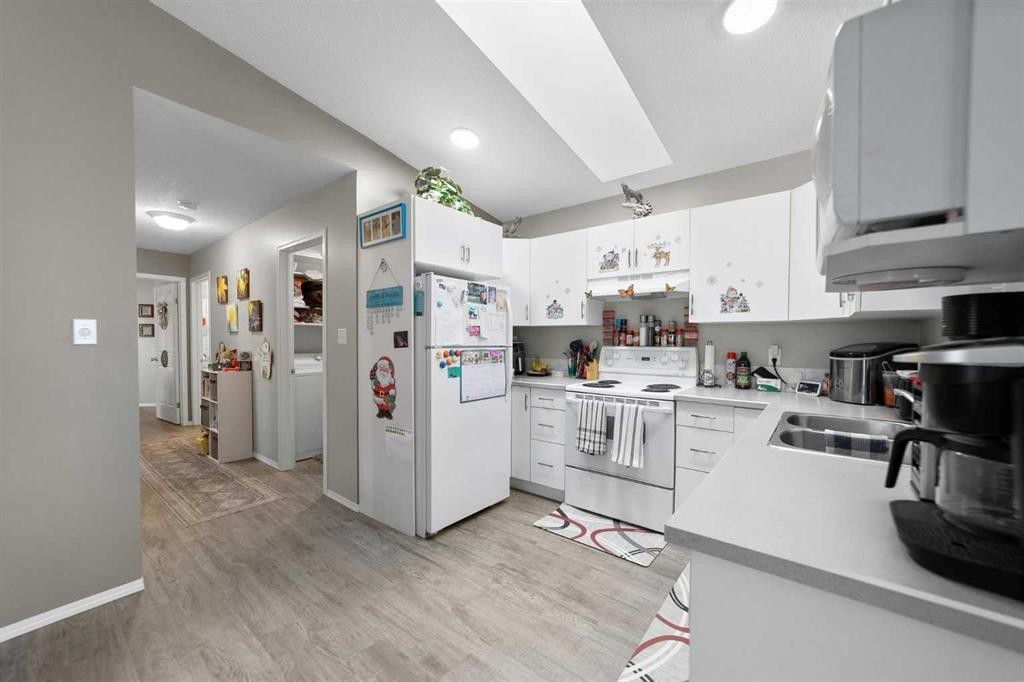 5213B 57 Street, Camrose, AB - Indoor Photo Showing Kitchen With Double Sink