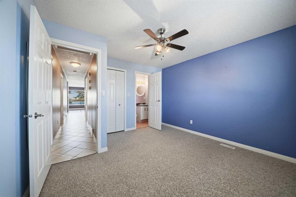 106 Denovan Crescent, Red Deer, AB - Indoor Photo Showing Other Room