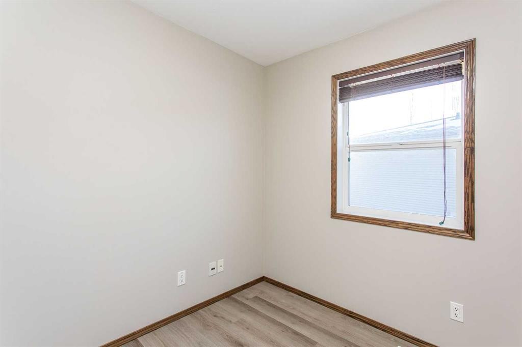 92 Iron Wolf Boulevard, Lacombe, AB - Indoor Photo Showing Other Room