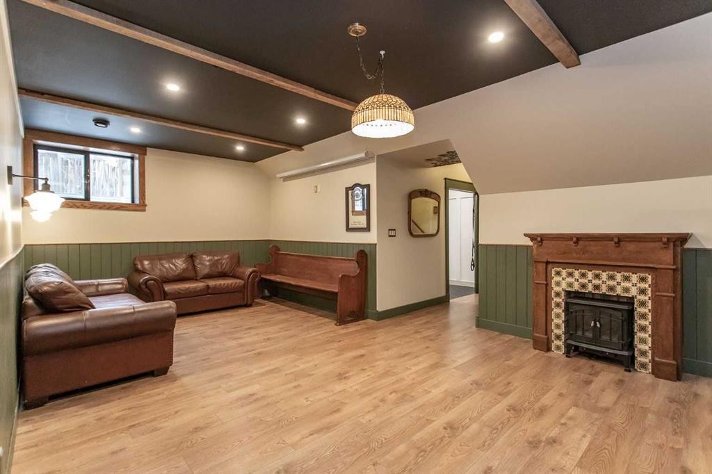 32 Carter Close, Red Deer, AB - Indoor Photo Showing Other Room With Fireplace