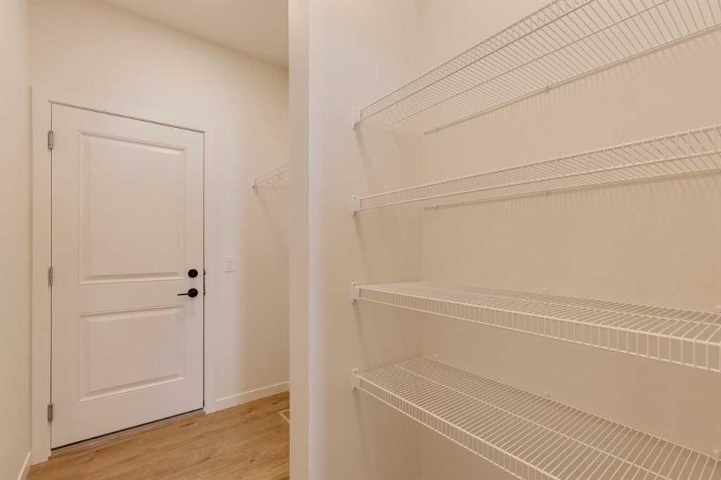 1419 Bayview Crescent Sw, Airdrie, AB - Indoor With Storage