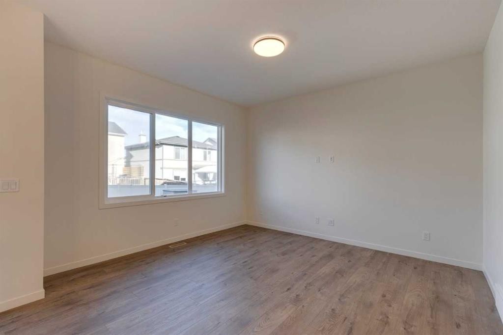 1419 Bayview Crescent Sw, Airdrie, AB - Indoor Photo Showing Other Room