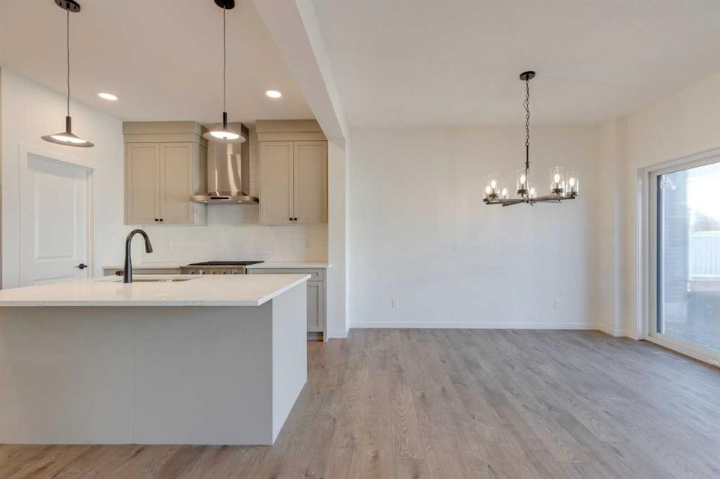 1419 Bayview Crescent Sw, Airdrie, AB - Indoor Photo Showing Kitchen With Upgraded Kitchen