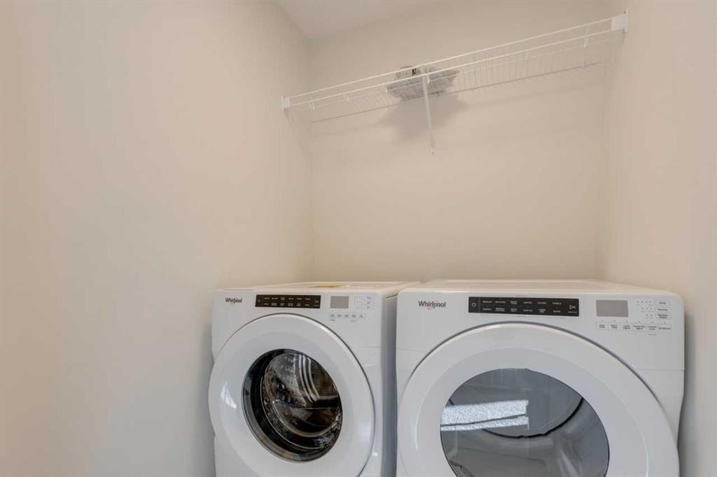 1419 Bayview Crescent Sw, Airdrie, AB - Indoor Photo Showing Laundry Room