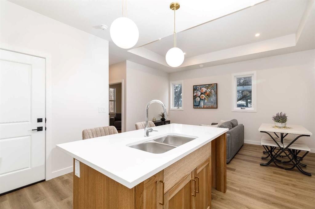 8-5463 55 Avenue, Lacombe, AB - Indoor Photo Showing Kitchen With Double Sink