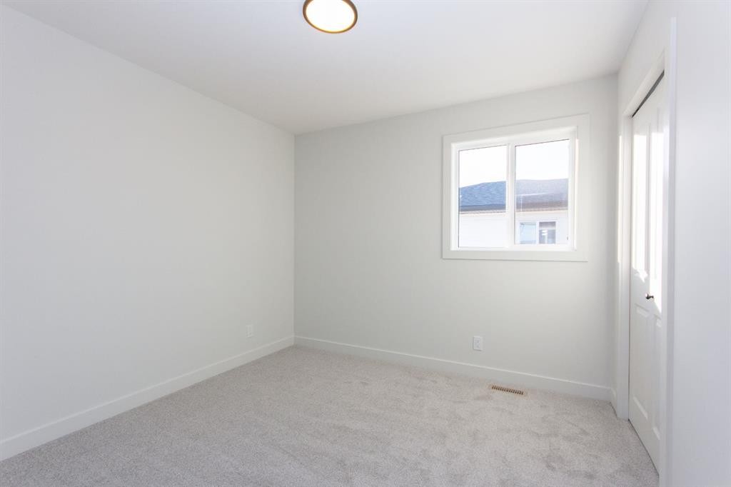 17 Trinity Street, Lacombe, AB - Indoor Photo Showing Other Room