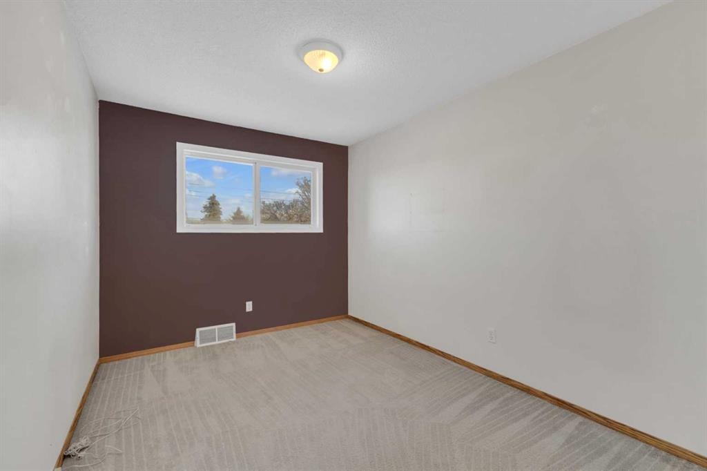 209-5831 57 Street, Red Deer, AB - Indoor Photo Showing Other Room