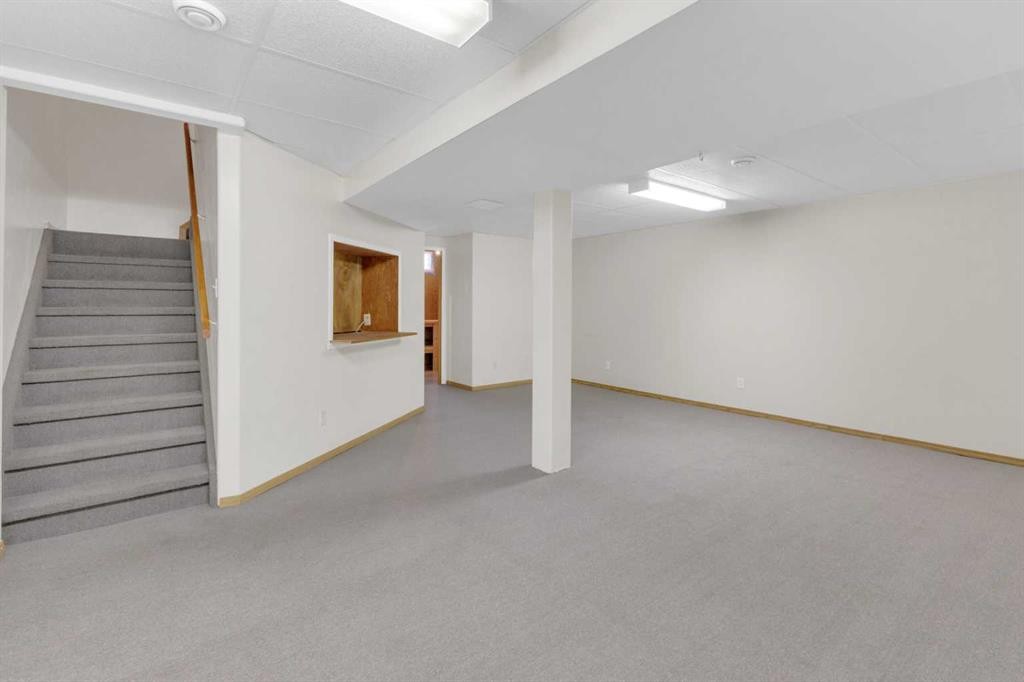 209-5831 57 Street, Red Deer, AB - Indoor Photo Showing Other Room