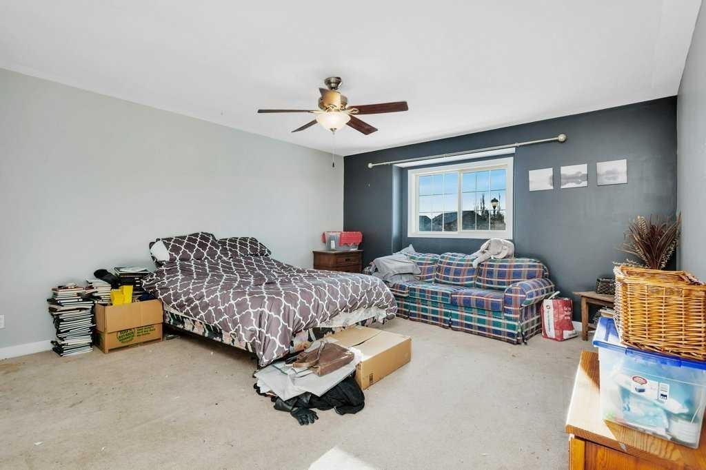 132 Sabre Road, Springbrook, AB - Indoor Photo Showing Bedroom