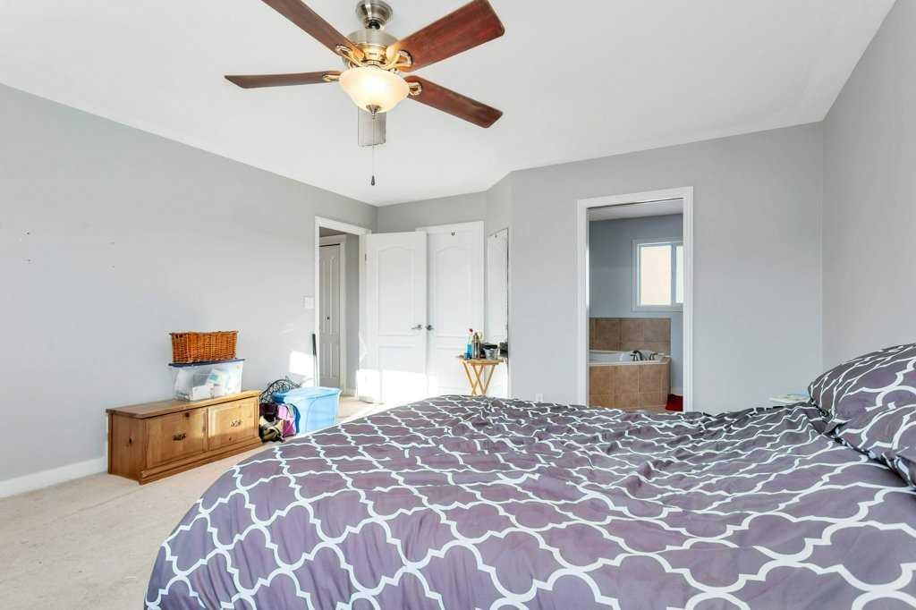 132 Sabre Road, Springbrook, AB - Indoor Photo Showing Bedroom