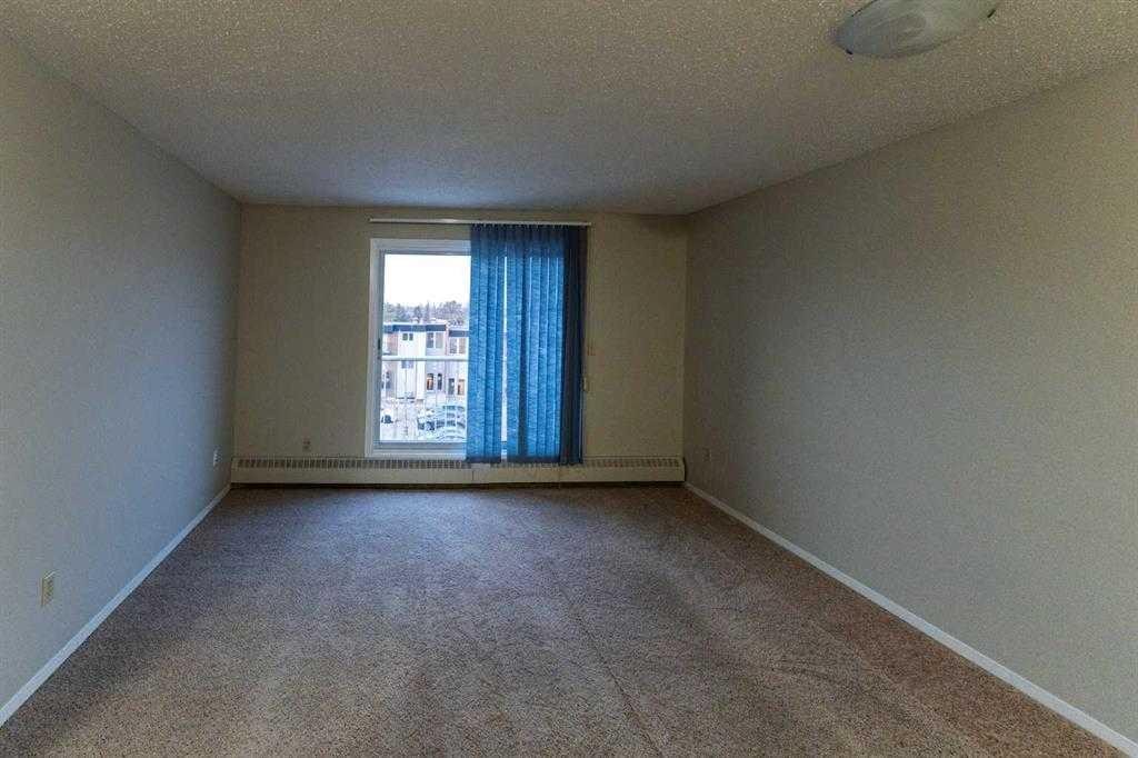 #101-406-4744 54 Street, Red Deer, AB - Indoor Photo Showing Other Room