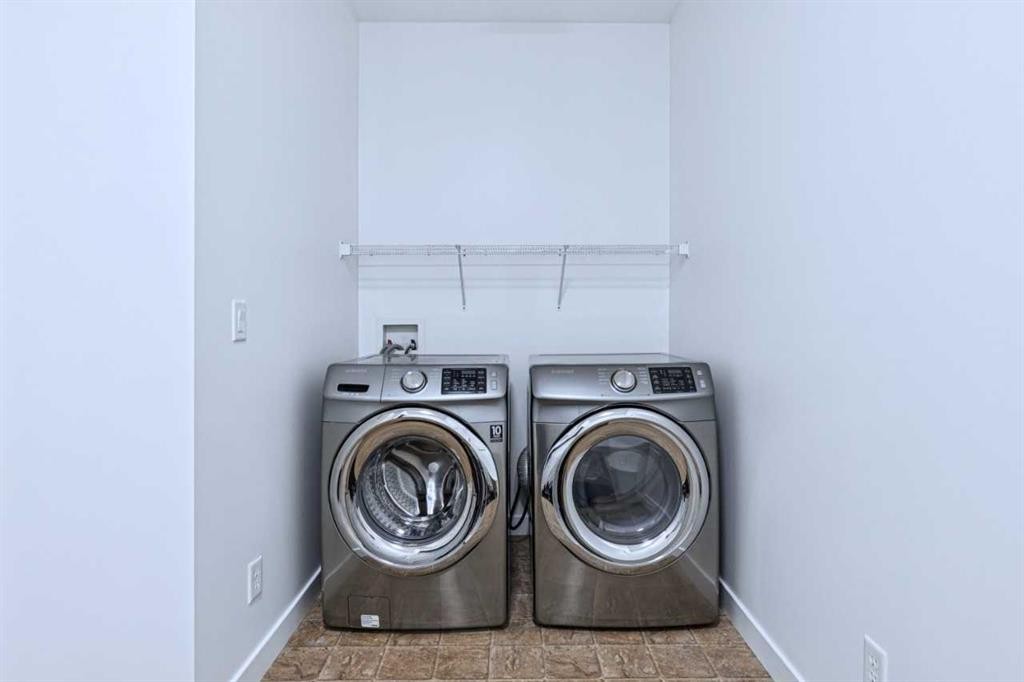 174 Brightonstone Landing Se, Calgary, AB - Indoor Photo Showing Laundry Room