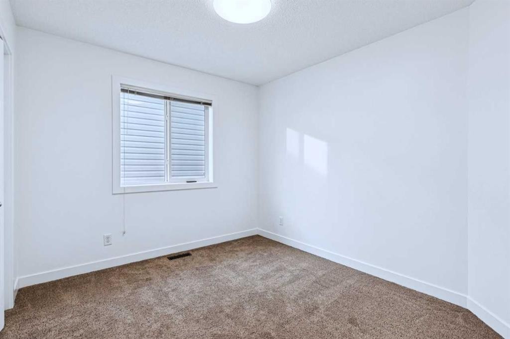 174 Brightonstone Landing Se, Calgary, AB - Indoor Photo Showing Other Room