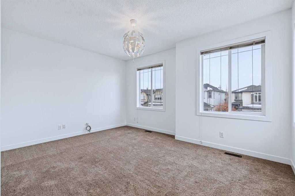 174 Brightonstone Landing Se, Calgary, AB - Indoor Photo Showing Other Room