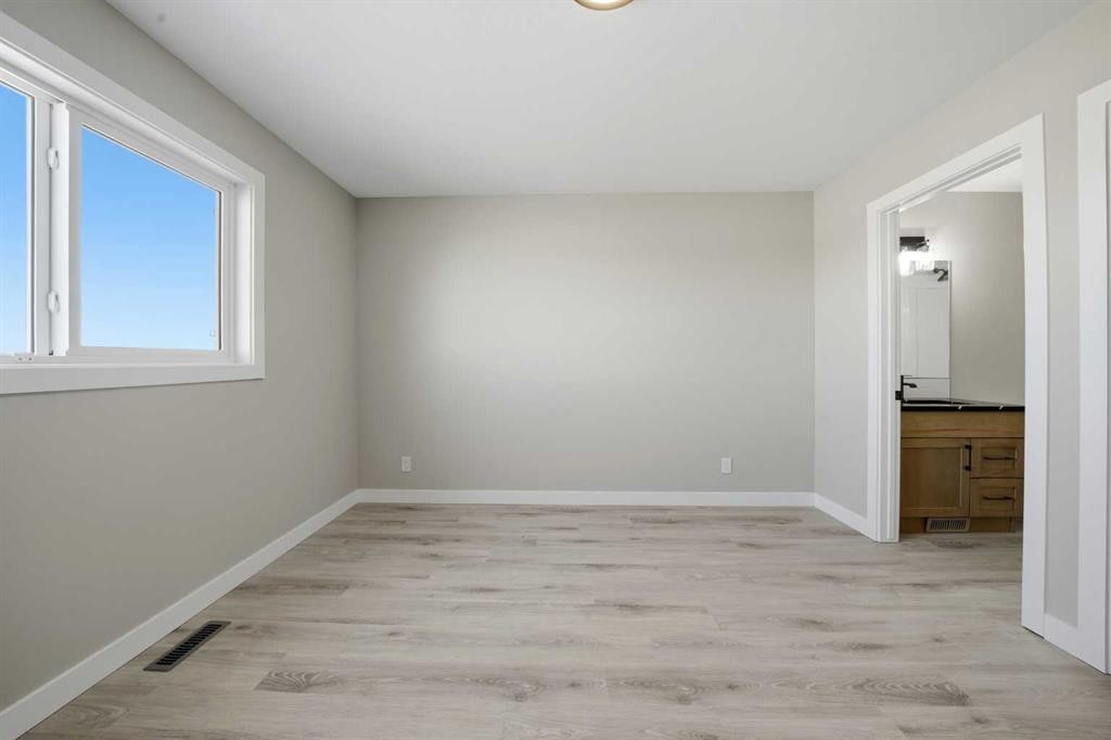125 Hampton Crescent, Sylvan Lake, AB - Indoor Photo Showing Other Room