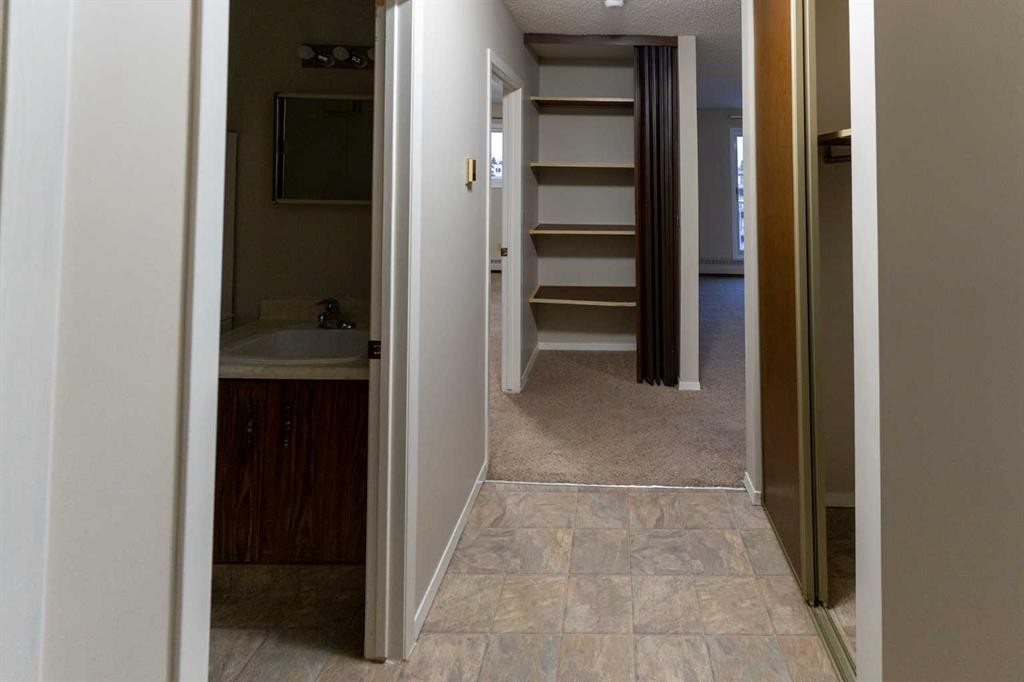 101-406-4744 54 Street, Red Deer, AB - Indoor Photo Showing Other Room