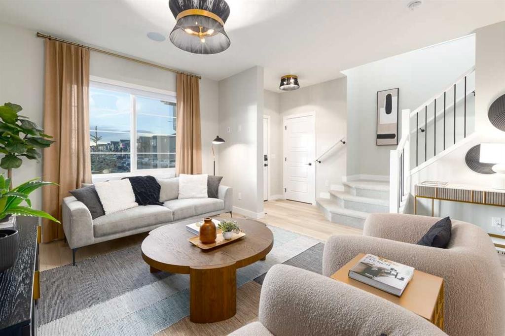 153 Bridgeport Gate, Chestermere, AB - Indoor Photo Showing Living Room