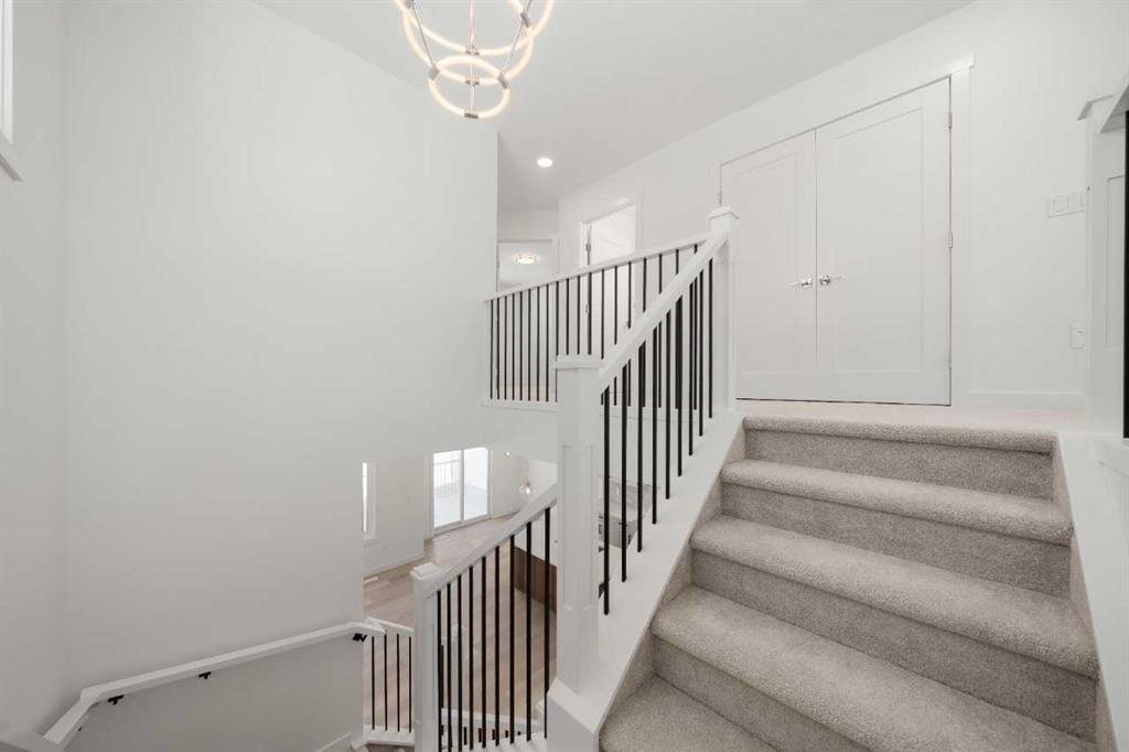 87 Heritage Manor, Cochrane, AB - Indoor Photo Showing Other Room