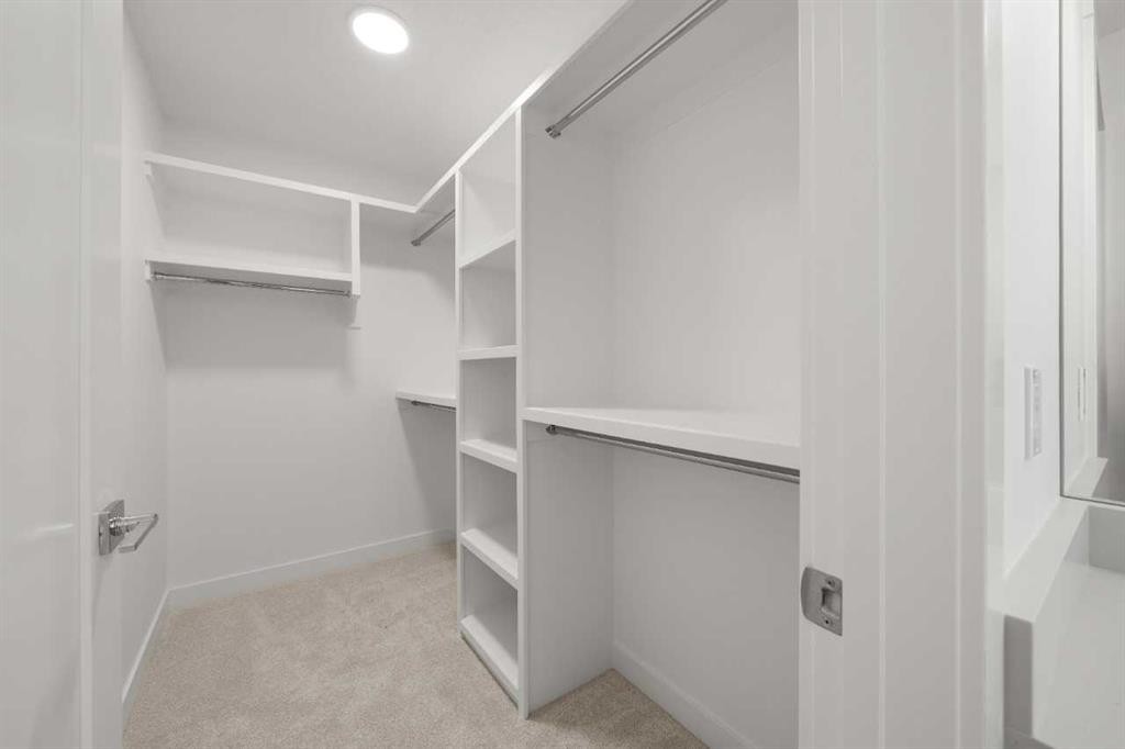87 Heritage Manor, Cochrane, AB - Indoor With Storage