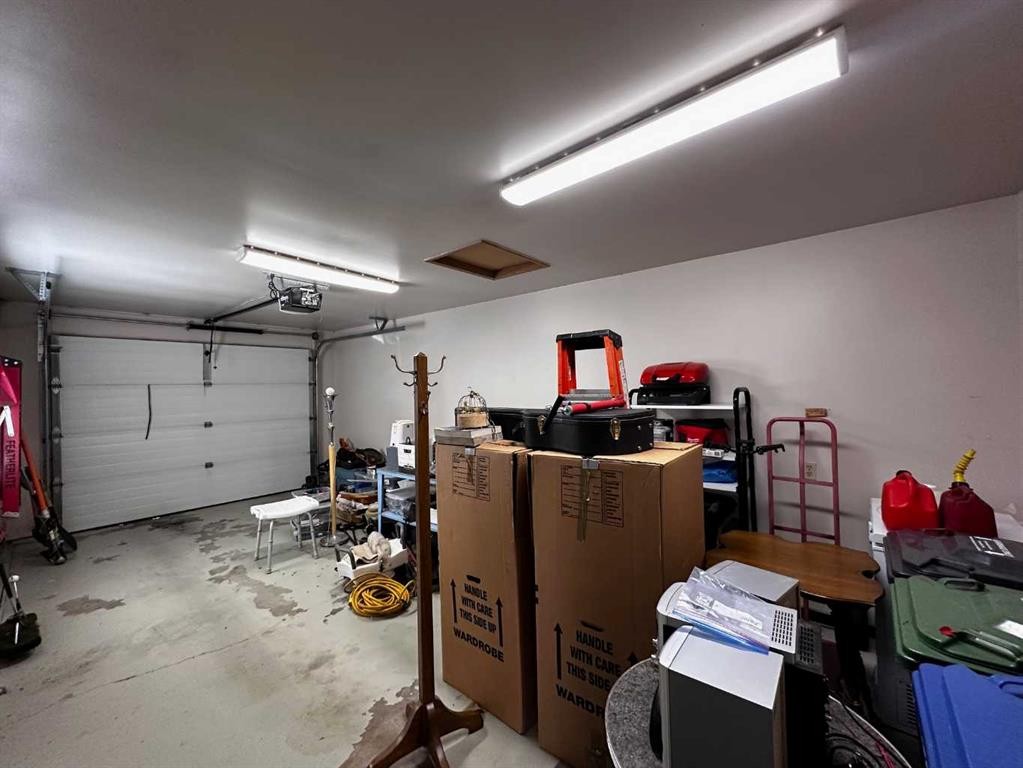 202 Ebert Close, Red Deer, AB - Indoor Photo Showing Garage