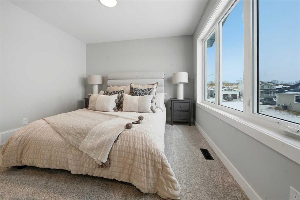17 Gray Close, Sylvan Lake, AB - Indoor Photo Showing Bedroom