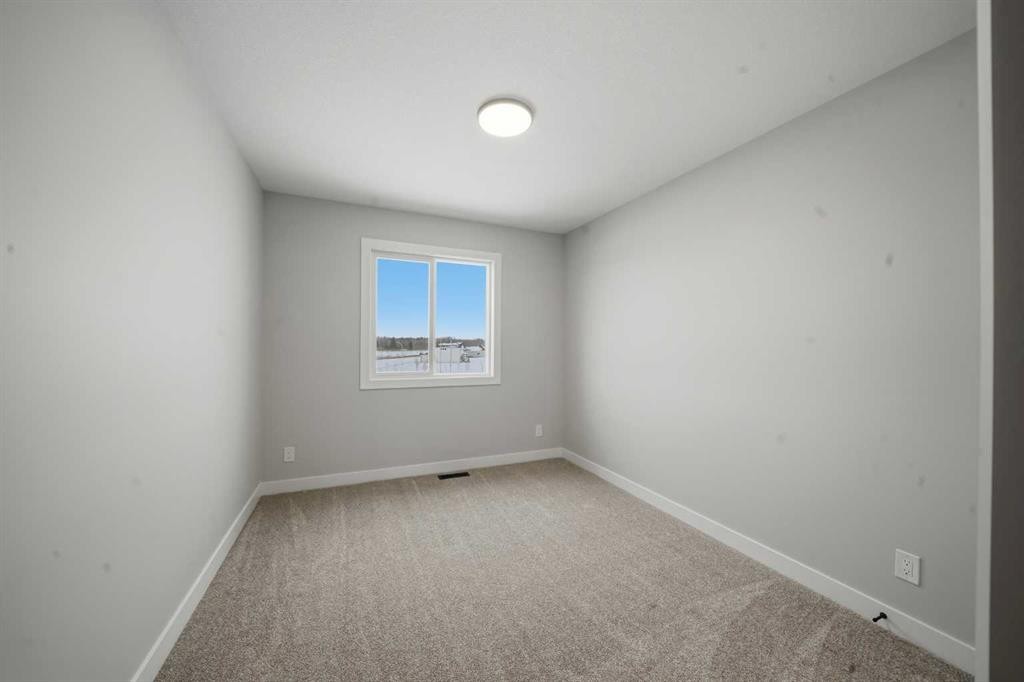 17 Gray Close, Sylvan Lake, AB - Indoor Photo Showing Other Room