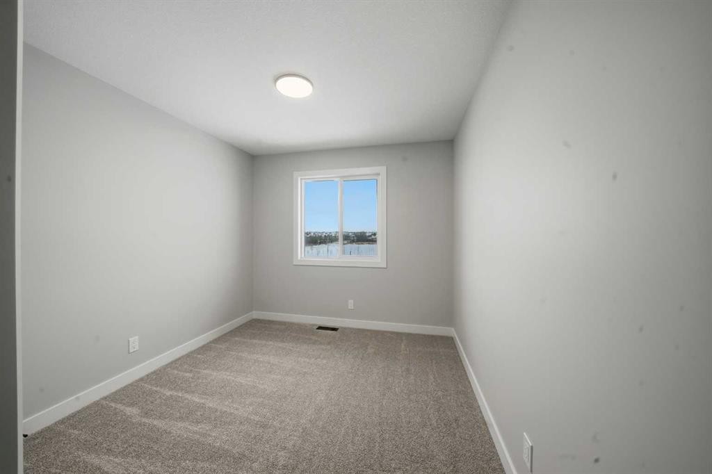 17 Gray Close, Sylvan Lake, AB - Indoor Photo Showing Other Room