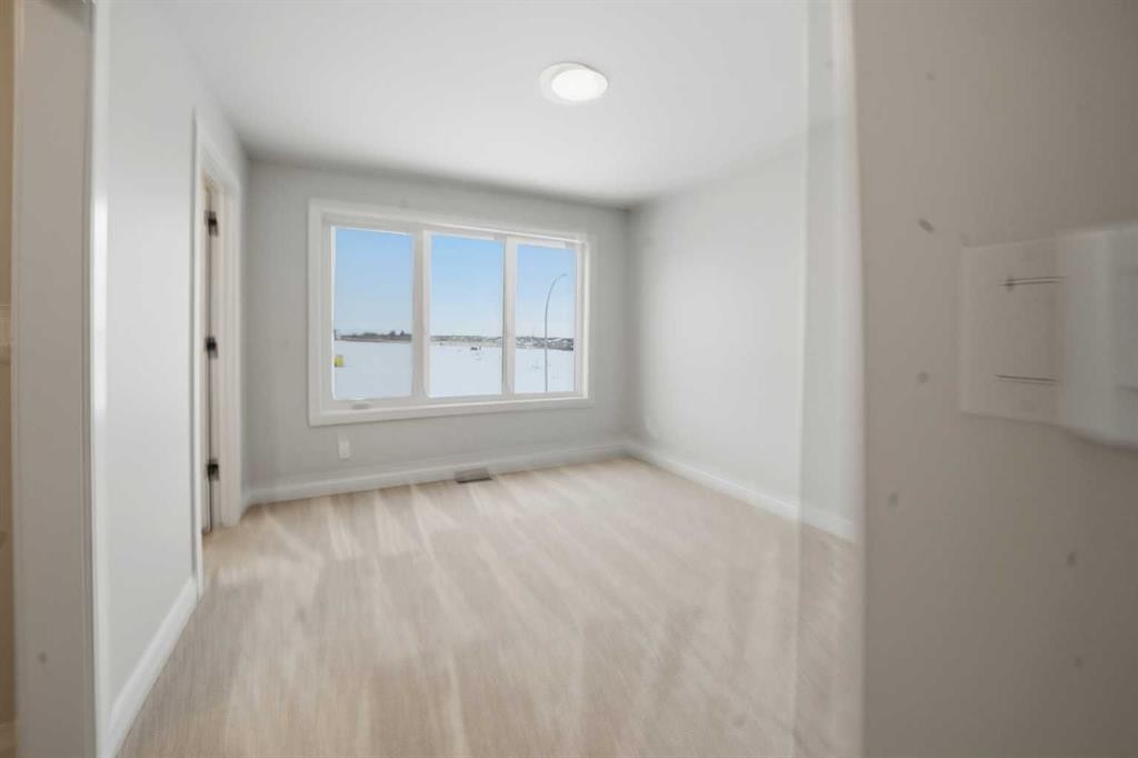 17 Gray Close, Sylvan Lake, AB - Indoor Photo Showing Other Room